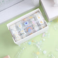 Five rolls of transparent adhesive tape with a Midsummer Daisy cartoon pattern, each 1.5cm wide.