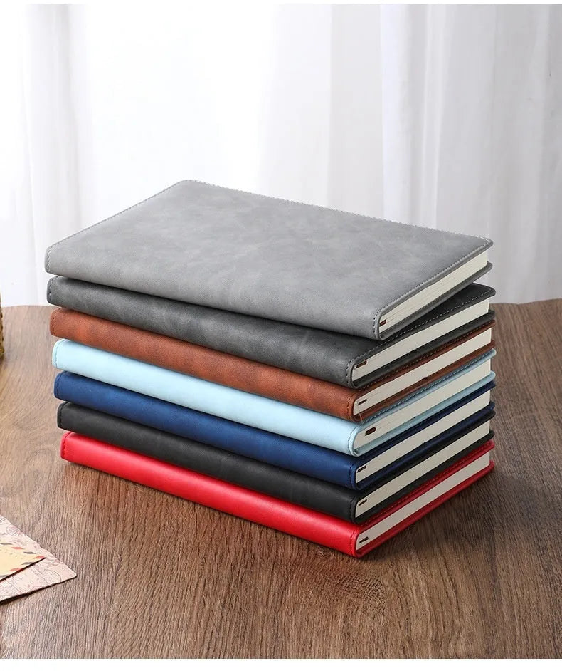 Customisable A5 notebook with PU leather cover in choice of colours, featuring wood-free paper.