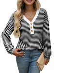 Women's loose fit patchwork V-neck pullover top with long sleeves and button fastenings.