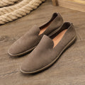 Handmade grey men's casual shoes with a wedge heel and leather upper.