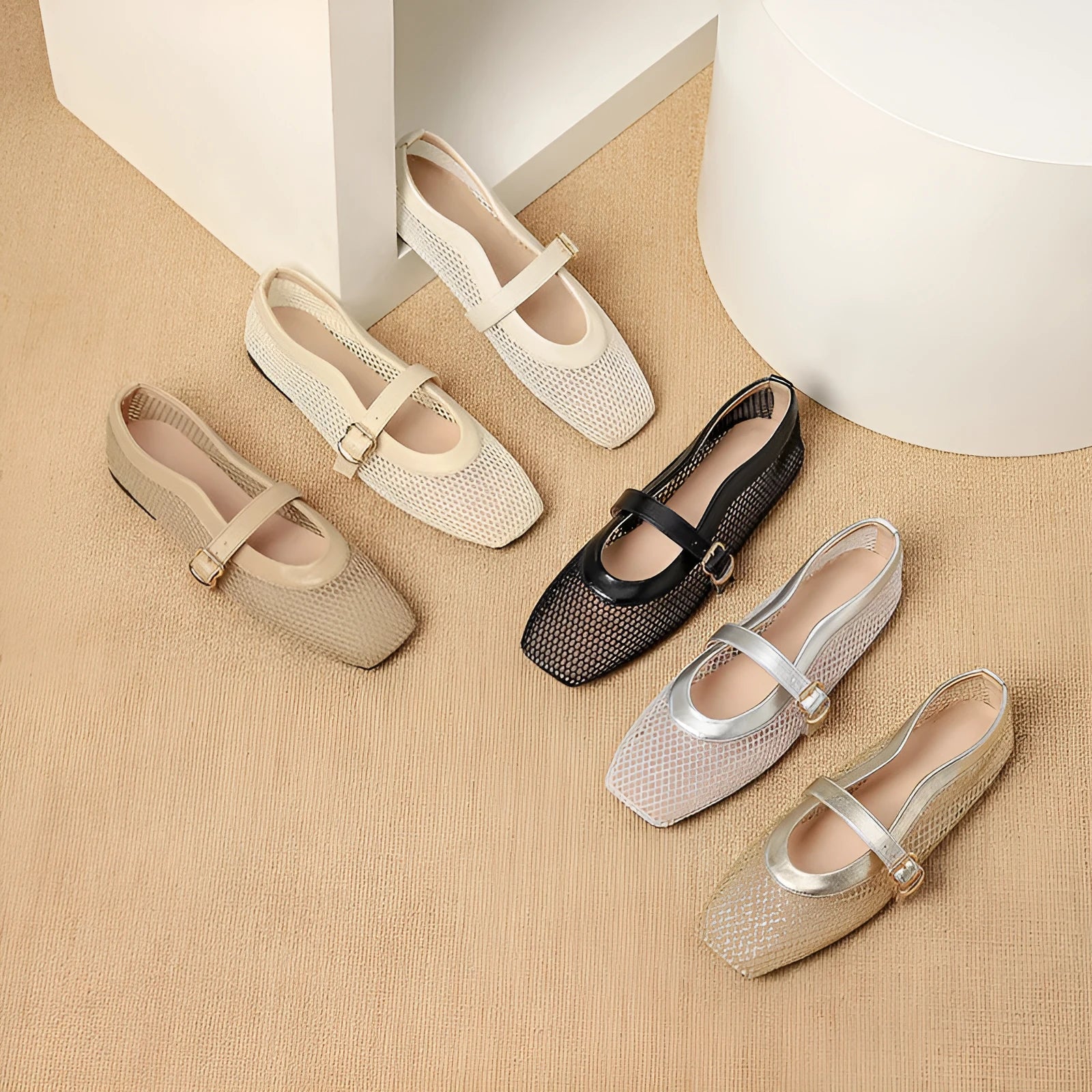 Women's beige mesh pump with square toe and adjustable buckle on flat heel.