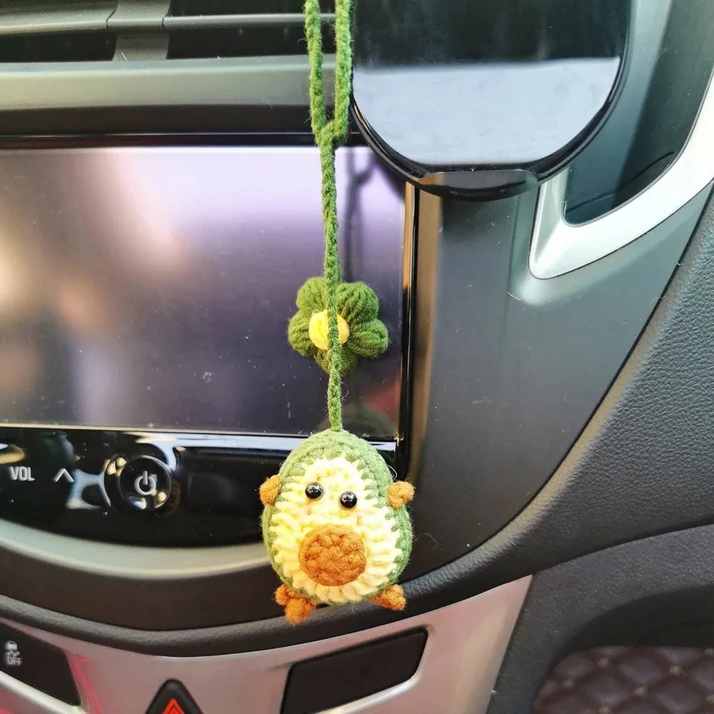 Handmade crocheted avocado rainbow flower car pendant in wool with cartoon styling