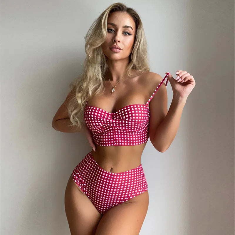 Women's plaid high-waist bikini swimsuit in rose red, showing the two-piece design and split-leg cut.