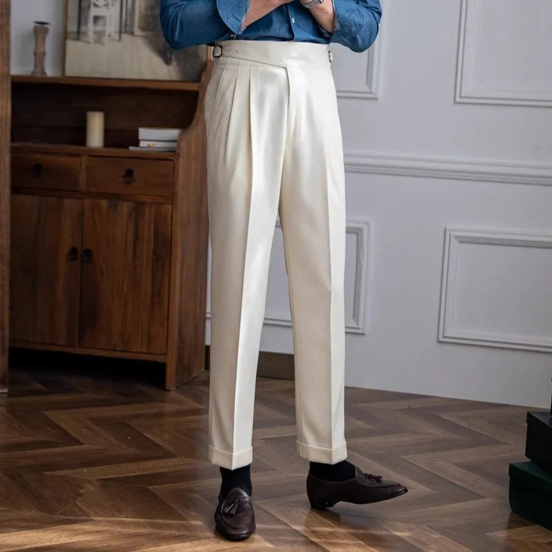 Man wearing black high-waisted straight-leg casual polyester trousers.