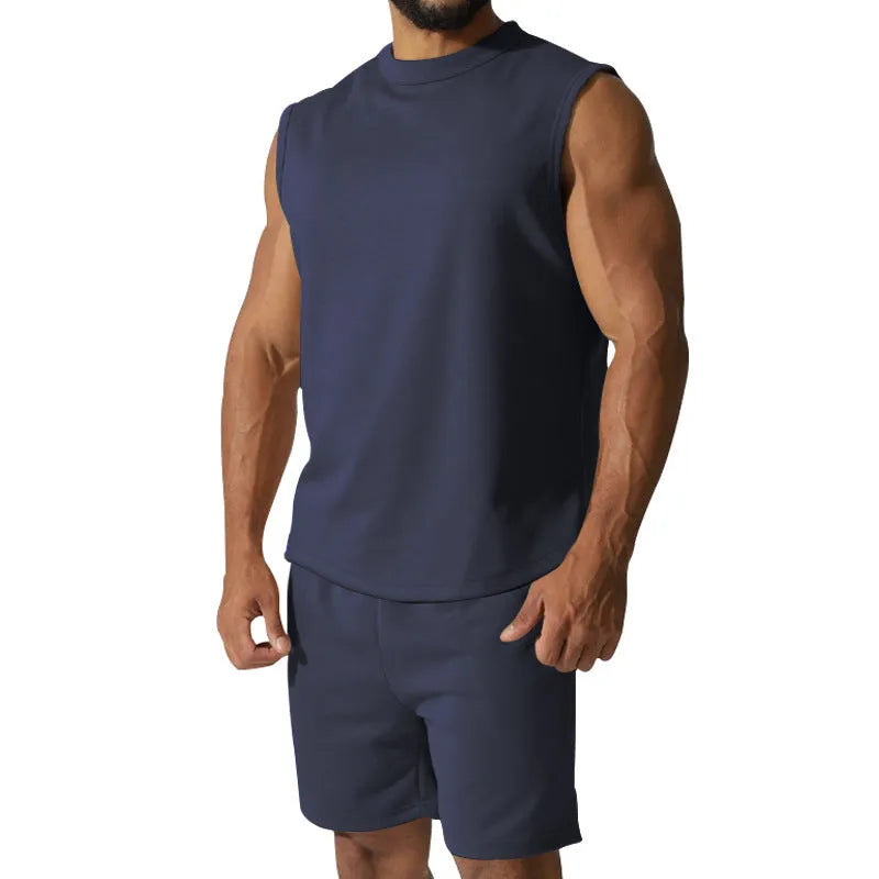 Men's solid colour sleeveless sports top and matching casual shorts set on a hanger