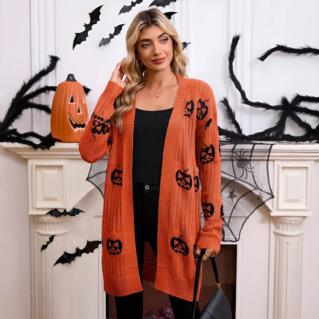 Women's black Halloween cardigan with orange Jacquard pumpkin head pattern on the front.