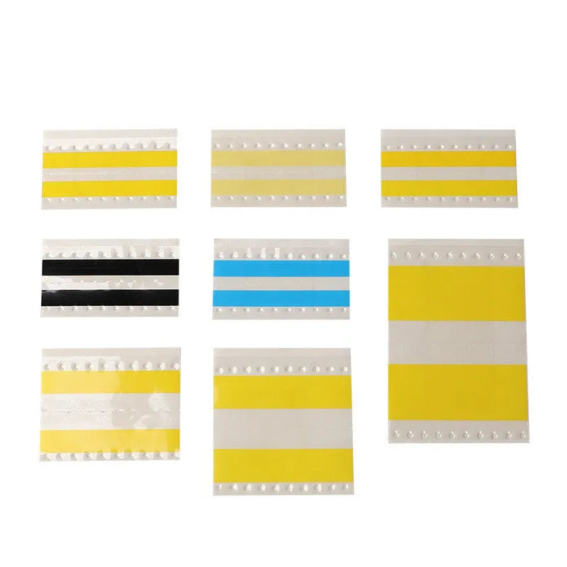 Rolls of SMT double-sided splicing tape in yellow, blue, black, and gum colours for placement machines.