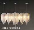 Silver Nordic aluminum LED chandelier with PMMA lampshade on ceiling in modern living room