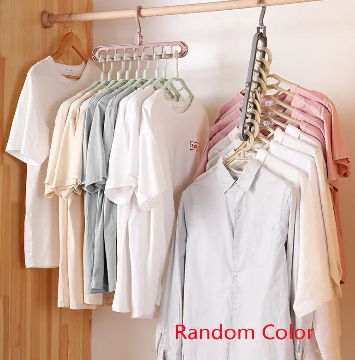 Plastic clothes hanger with rotating hook in pink colour, showing 33cm length dimension