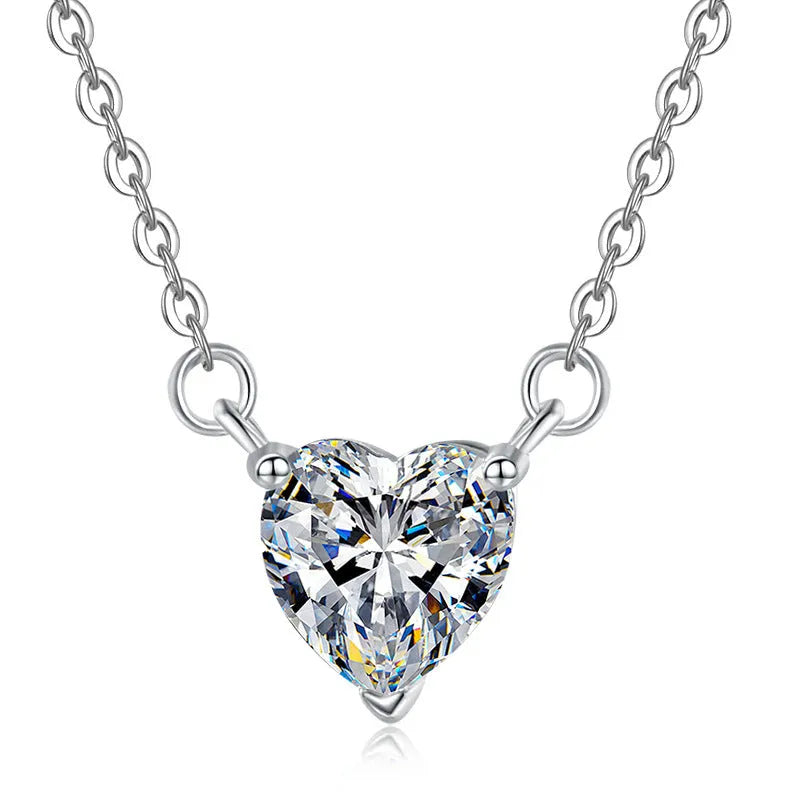 925 silver heart-shaped moissanite pendant necklace with cross chain on display