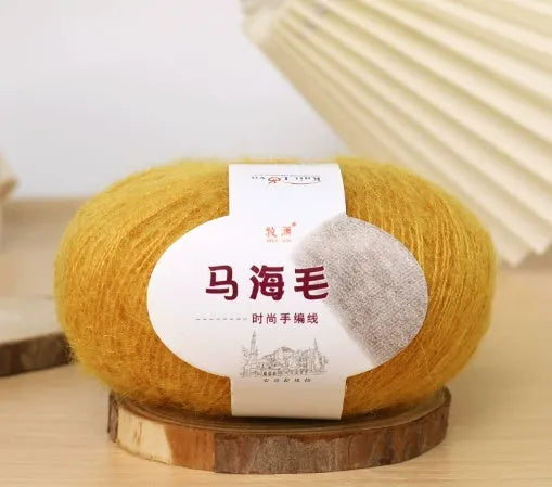 Mohair wool ball for DIY scarf knitting in assorted colours on white background
