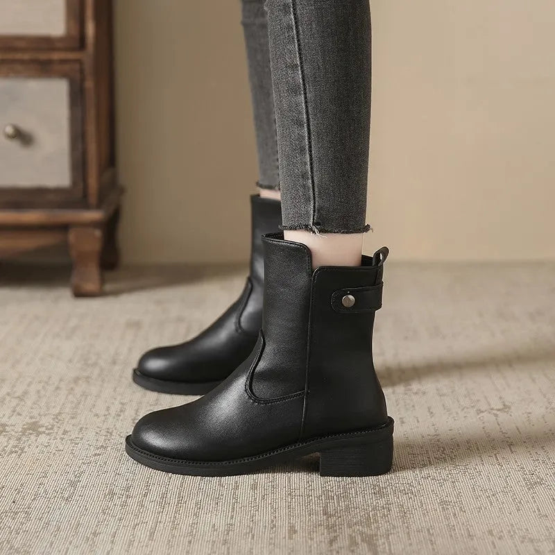 Women's black side zip ankle boots with round toe and low rubber sole