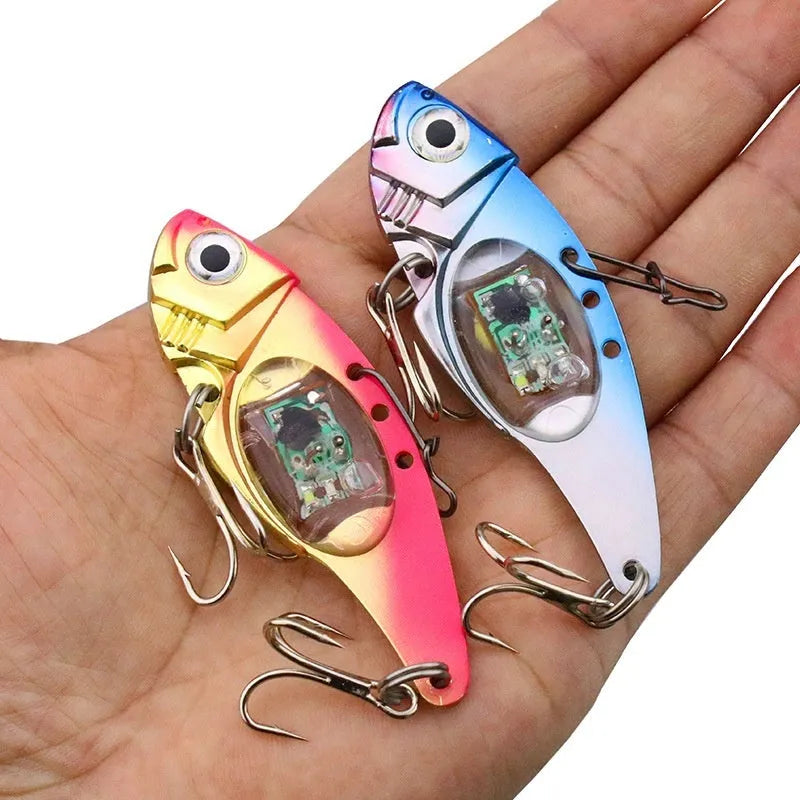 Metal vib electronic fishing lure with luminous construction in blue and red colour options