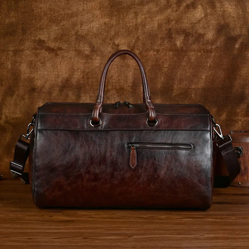 Handmade retro leather bag in vintage brown with large capacity.