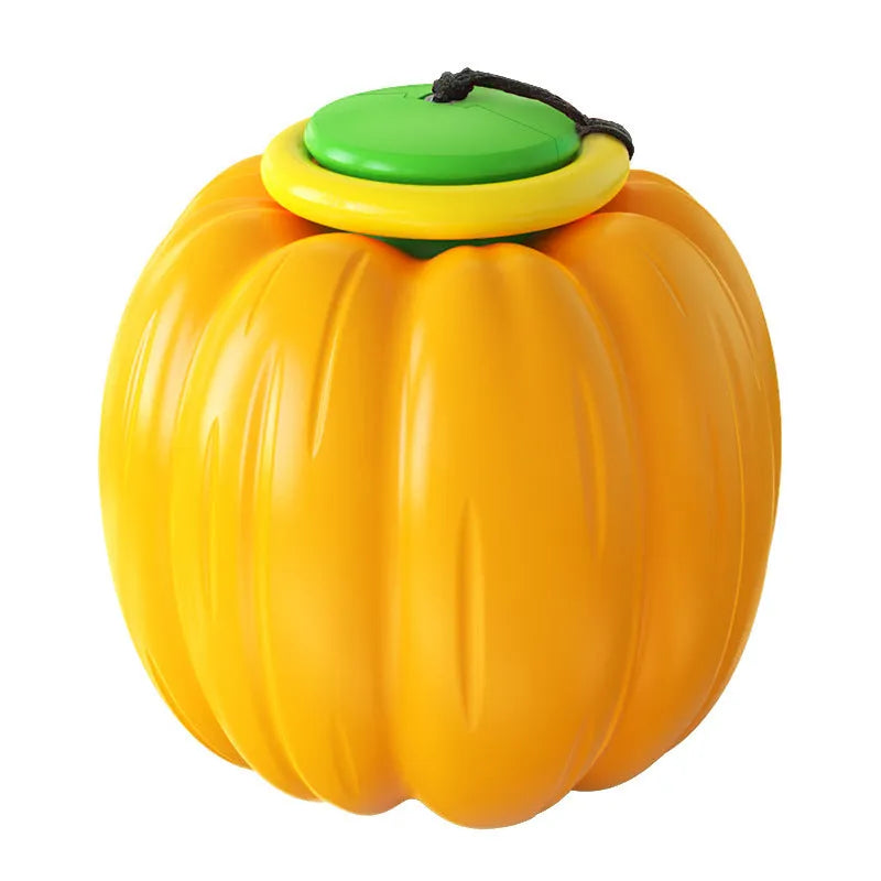 Green, orange, and yellow pumpkin-shaped squeaker dog ball toy for small dogs, shown with size scale.