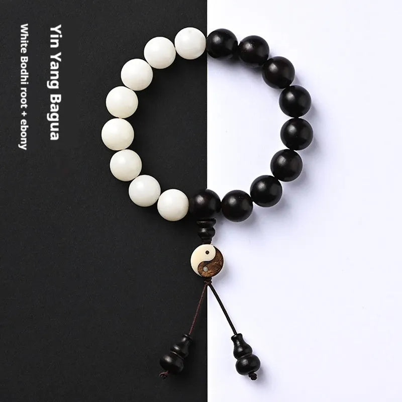 Handcrafted Bodhi seed bracelet with white Corypha Umbraculifera and Blackwood beads in eight-diagram pattern