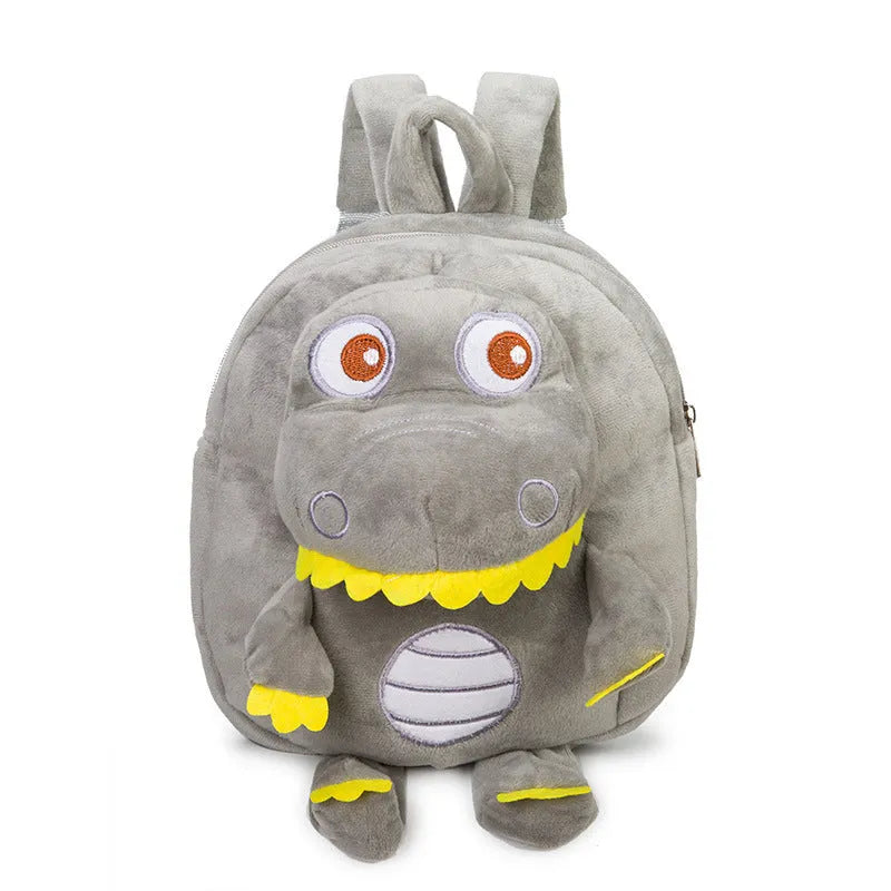 Colourful dinosaur plush backpack for children with soft handle and embroidery detail.