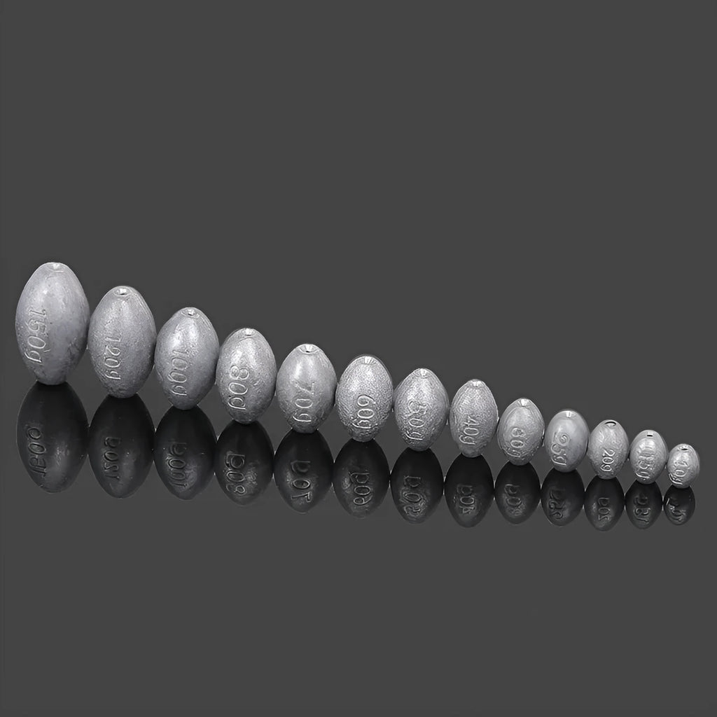 Tongxin olive-shaped rugby lead sinker for sea fishing with scale texture, showing plastic core construction.