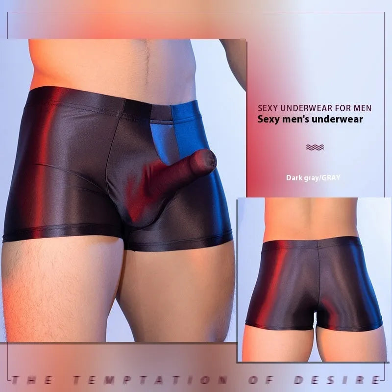 Men's red boxer shorts with an elephant nose pattern, showing mid-waist and seamless design.