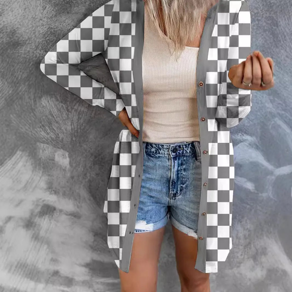 Women's long grey plaid knitted coat cardigan with contrasting colour blocks, loose fit, and regular sleeves.