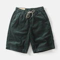 Men's khaki cargo shorts with straight leg cut and cargo pockets on thigh