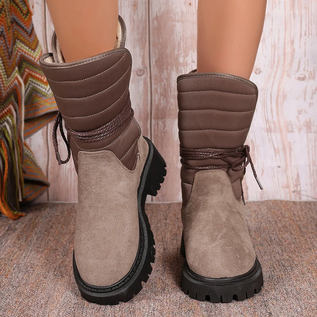 Women's black chunky heel snow boots with lace-up design and fleece lining