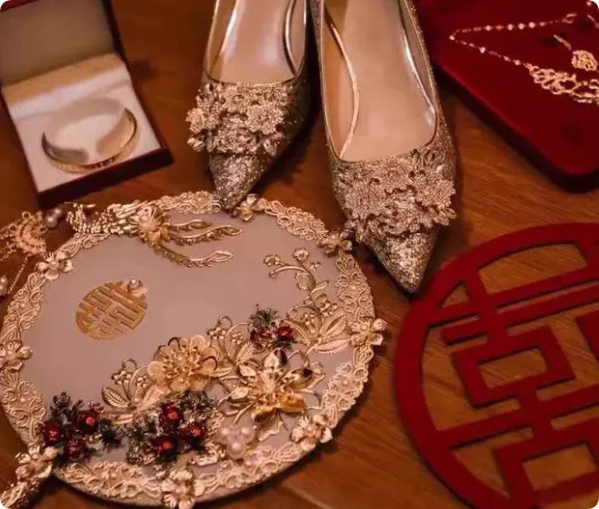 Champagne pointed toe wedding shoes with crystal rhinestone detail on a fine high heel.