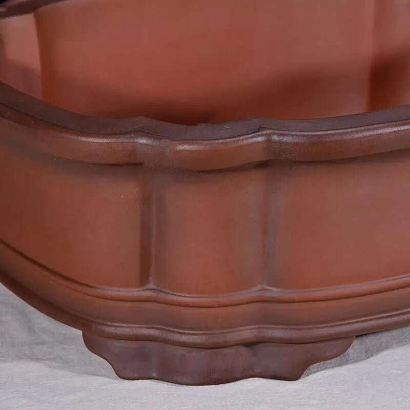 Large antique-style rectangular purple clay flower pot with Chinese design elements.