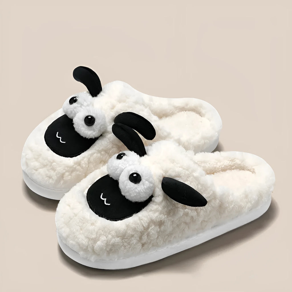 Brown thermal cotton slip-on slippers with a suede upper and a light-coloured PVC sole.