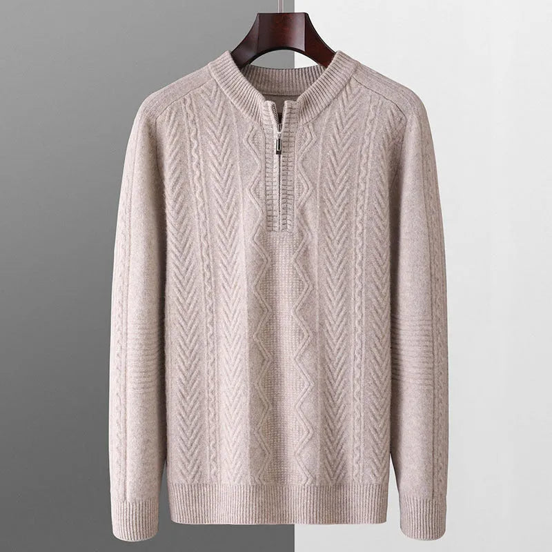 Man wearing a beige pure wool loose fit sweater with a diamond lattice pattern and a half-zip neck.