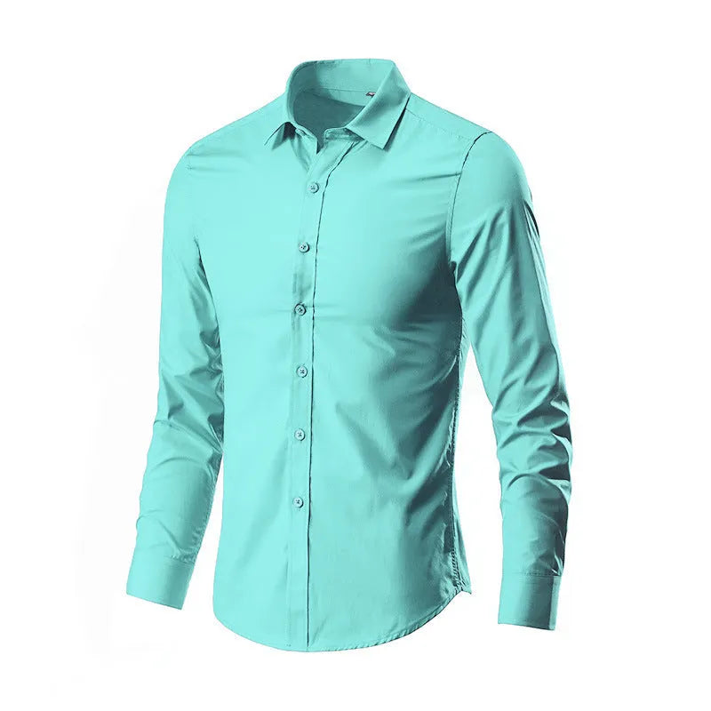 Man wearing a loose-fit linen long sleeve shirt in a neutral colour, showing the slim profile and button front.