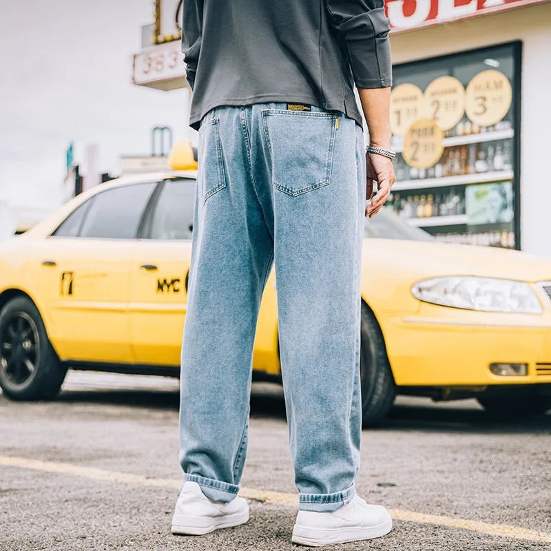 Men's loose straight jeans in cotton fabric available in dark blue, light blue and grey colours