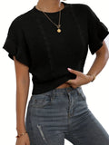White loose knitted women's pullover sweater with ruffled short sleeves and a textured 3D pattern.