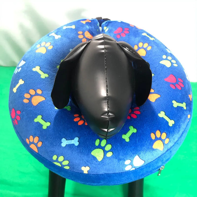Blue inflatable PVC pet recovery collar with soft flocking guard circle for dogs, deflated state