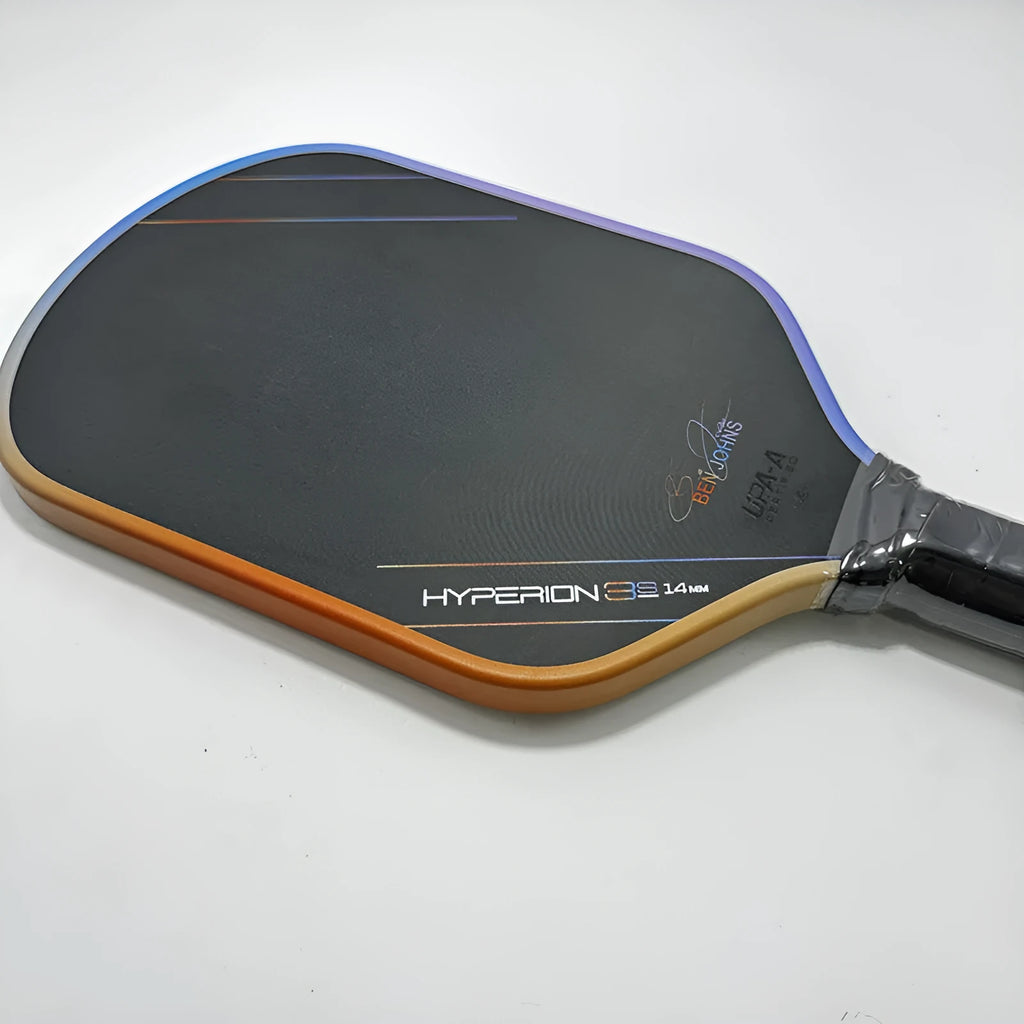 Aurora multicolour T700 carbon fibre pickleball racket with matte finish and honeycomb core.