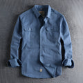 Men's solid colour long sleeve cotton shirt in cardigan style, shown in light blue.