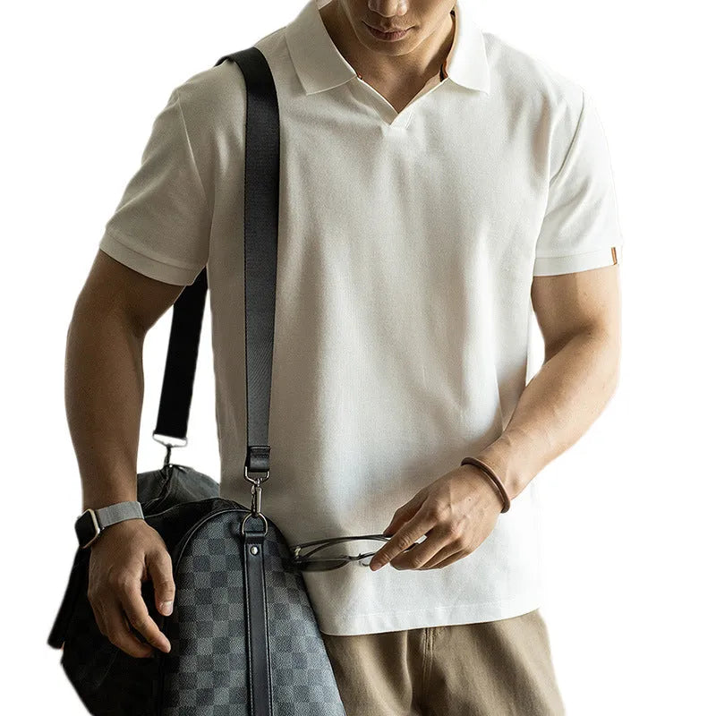 American-style short-sleeve polo shirt in blue, shown on a model.