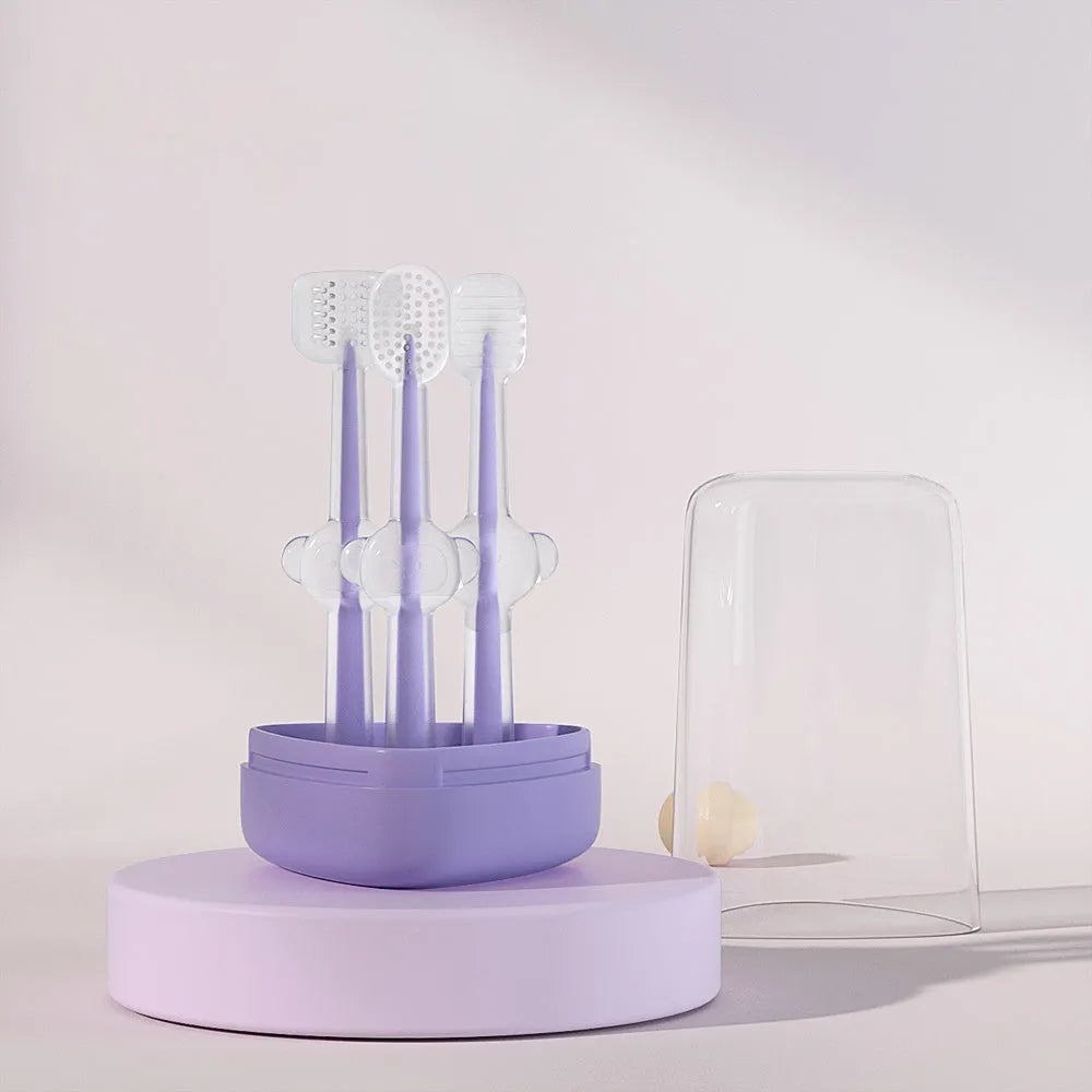 Pet toothbrush with flexible silicone brush head in blue, green, and purple colours for cat and dog dental care