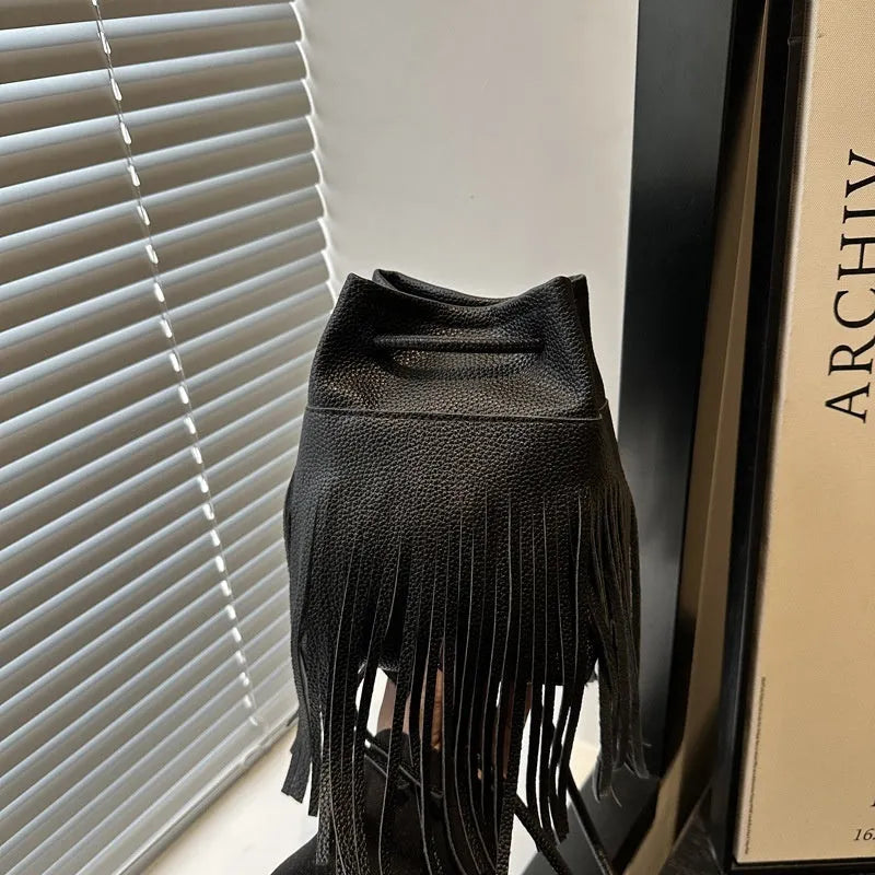 Women's soft leather tassel small satchel in bucket shape with open pocket, five colour options