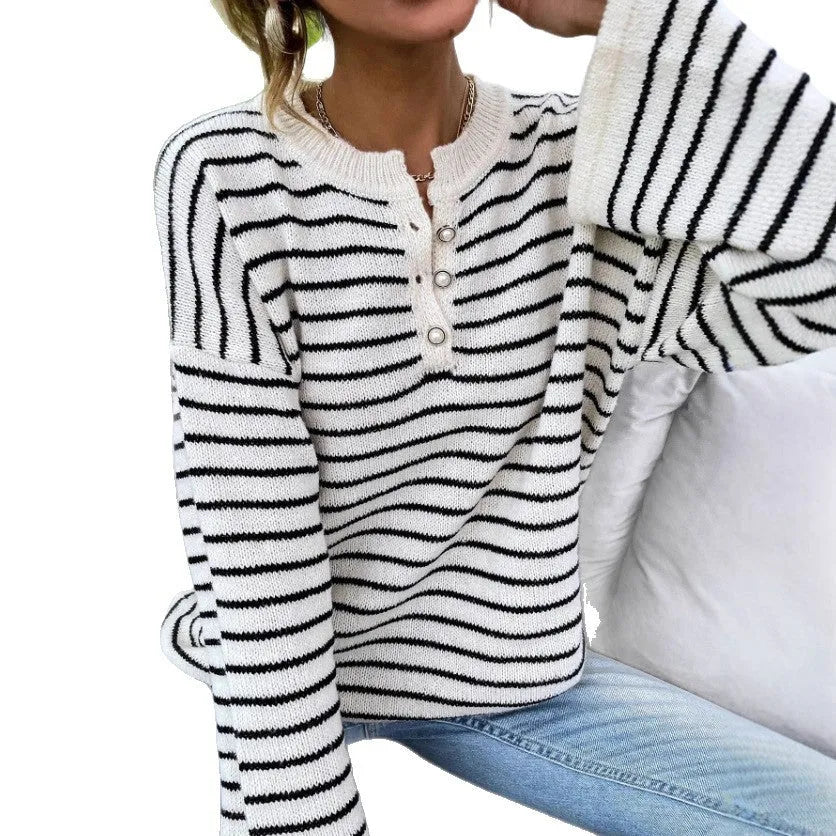 Black striped women's casual long sleeve top with drop shoulders and button details