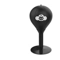 Tabletop boxing speed ball with suction cup base, inflatable PU leather sphere, and pump on a wooden desk.