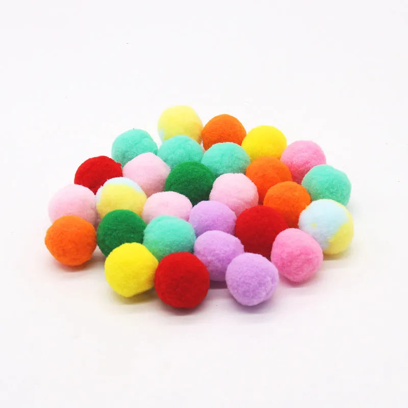 Plush cat toy launch gun with soft yarn balls for interactive indoor pet play.