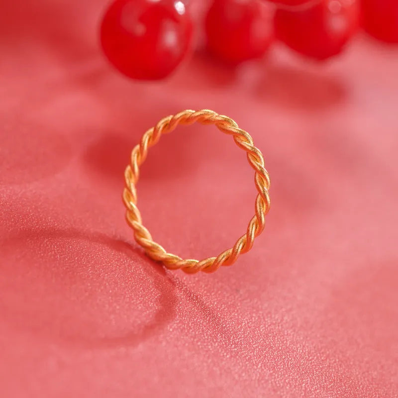 Women's brass gold plated ring showing twist, simple bracelet matte, and simple bracelet glossy styles