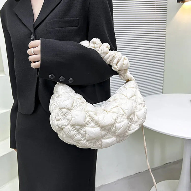 Women's nylon shoulder messenger bag in a solid colour with a long strap, showing front view.