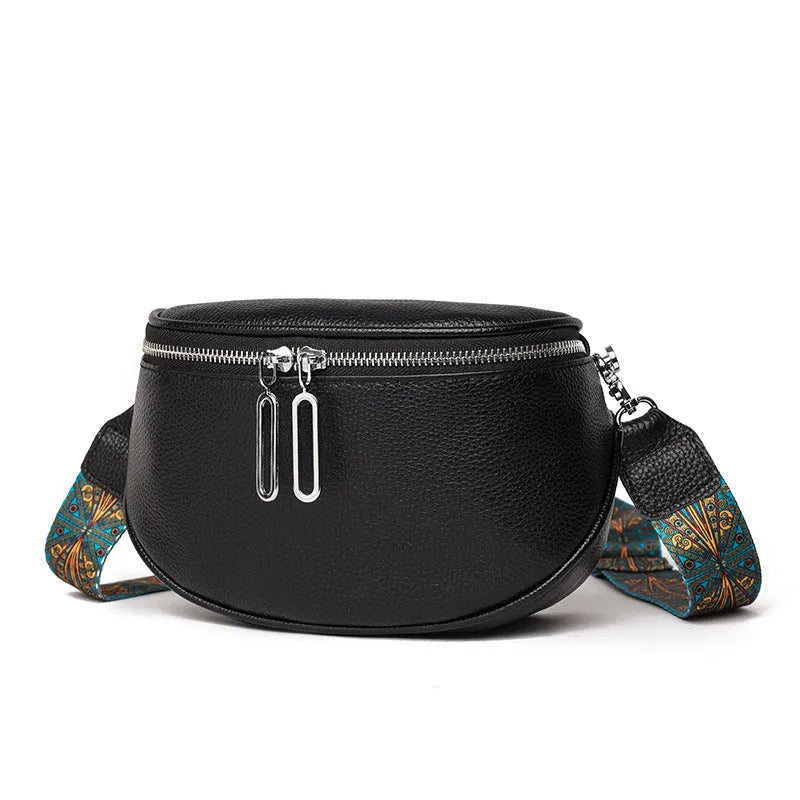 Women's soft PU leather messenger bag in saddle shape with cross-body strap, shown in green colour.