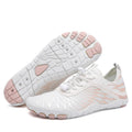 Men's white and black lace-up casual outdoor shoes with rubber sole on a plain background.