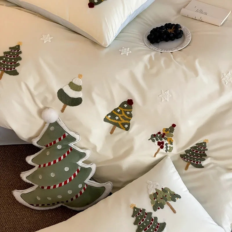 Pure cotton four-piece bedding set with embroidered Christmas tree pattern showing duvet cover, bed sheet and pillowcases