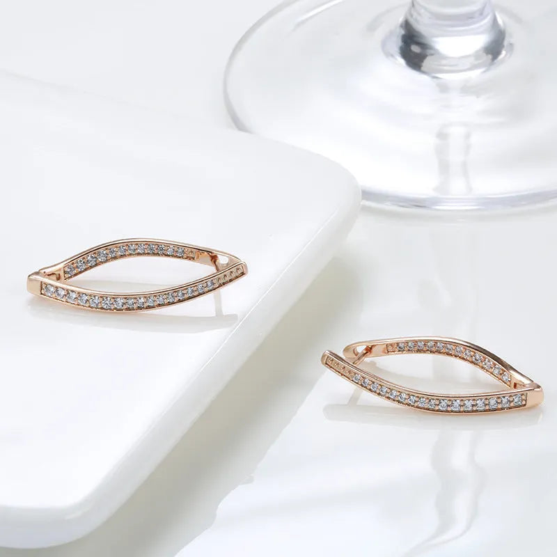 Copper geometric stud earrings with zircon details in H0493 colour.