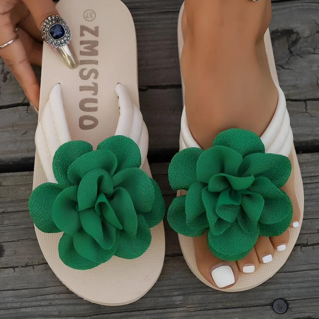 Women's floral pattern PU slippers in beige, shown in a casual flip-flop style with a round toe.