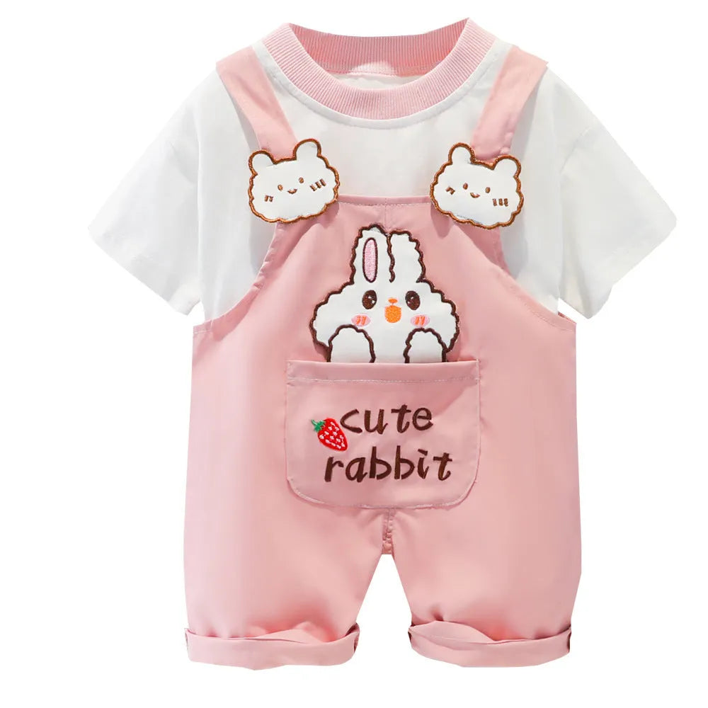 Yellow cartoon print cotton baby overalls with short sleeves and adjustable shoulder straps on a hanger.